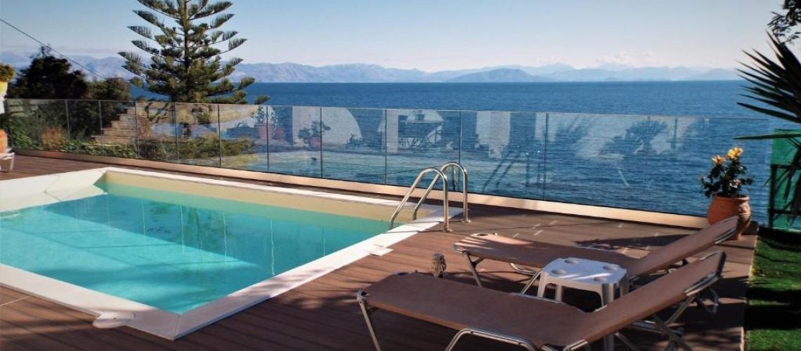 Μονοκατοικία δίπλα στη θάλασσα με τζάκι και πισίνα Αχίλλειο Κέρκυρα Detached house next to the sea with fireplace and swimming pool Achilleio Corfu εικόνα ακινήτου